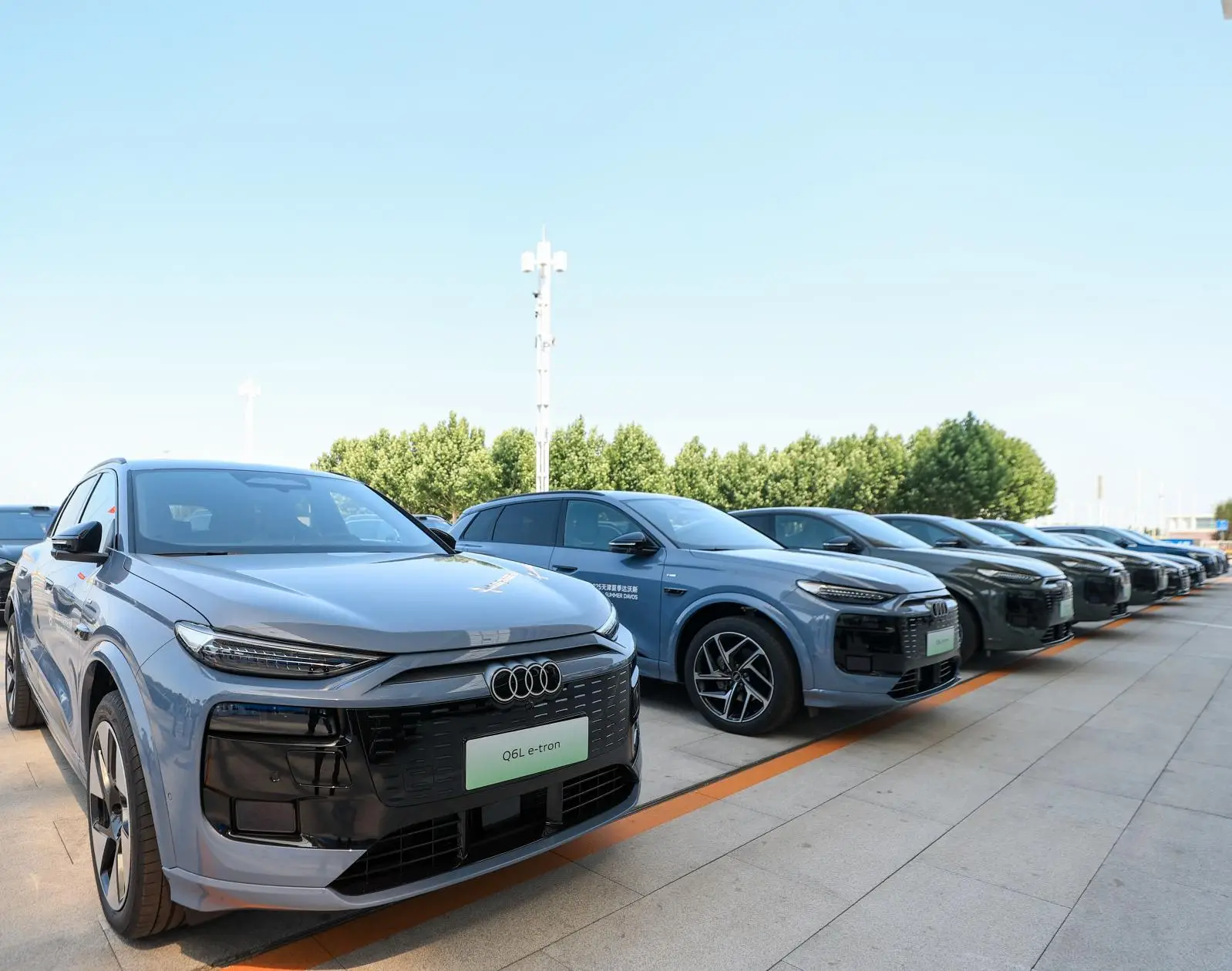 百年基因交融新时代企业家精神 一汽奥迪Q6L e-tron鼎力支持2025夏季达沃斯论坛